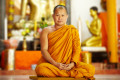 Peaceful monk in saffron robes Stock photo
